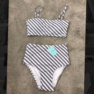 Two piece grey and white striped swimsuit